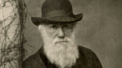 Charles-Darwin-portrait-standing-photo-1881